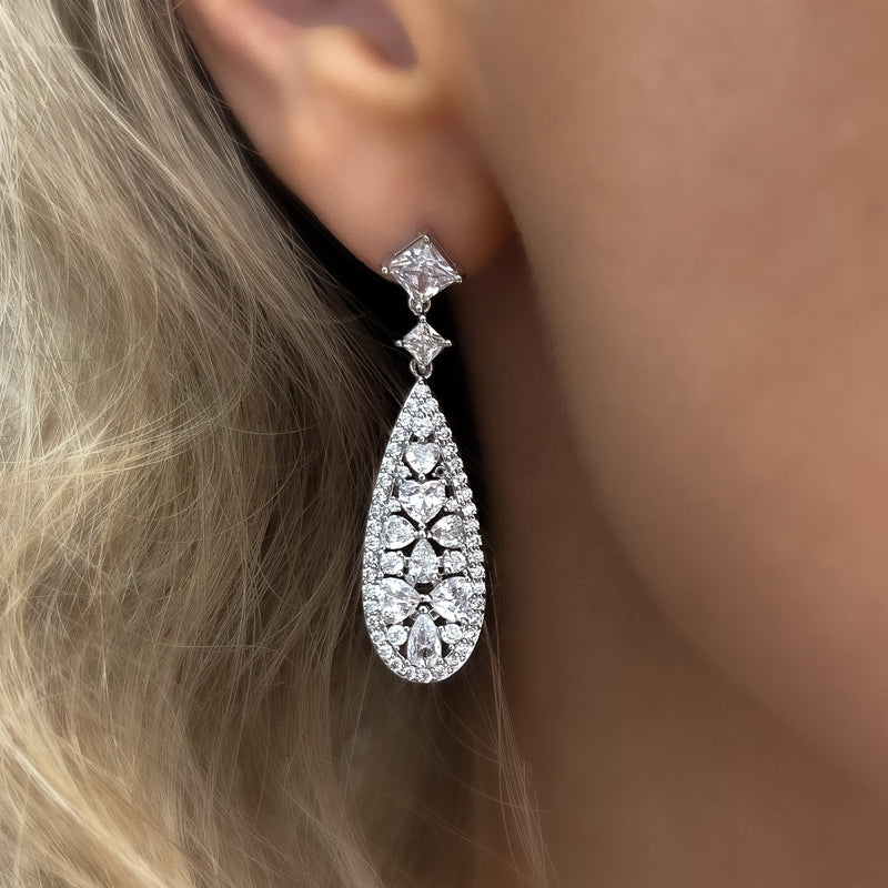 Silver diamond store dangle earrings